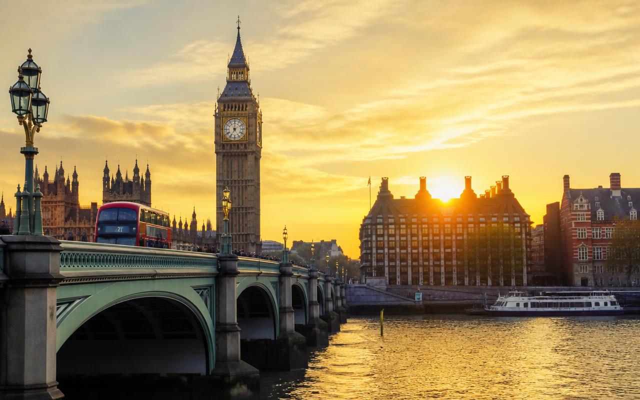 Big Ben and Westminster Bridge over the River Thames at golden hour, London